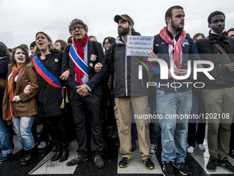 Demonstration against the use of the French constitution's Article 49,3, allowing the government to bypass parliament and force through cont...