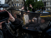 Demonstration against the use of the French constitution's Article 49,3, allowing the government to bypass parliament and force through cont...