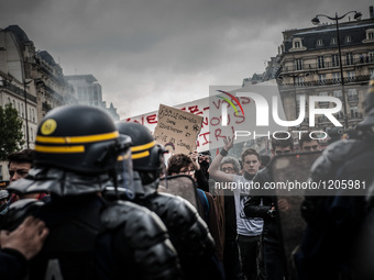 Demonstrators during a protest after the French government made use of the constitution's Article 49-3 allowing them to bypass parliament to...