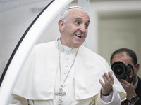 Pope Francis reacts as he arrives to celebrate an extraordinary Jubilee Audience as part of ongoing celebrations of the Holy Year of Mercy i...