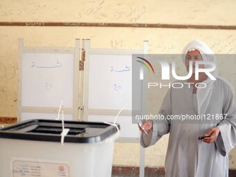 An Egyptian voter in a polling station in the Menia City, south of Cairo on the first days of elections on May 26, 2014 in Cairo, Egypt. Egy...