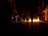 Protesters during clashes with police in the Alevi enclave of Okmeydani on Istanbul on May 26, 2014. (