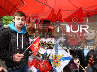 Kaliningrad, Russia 9th, May 2014 People sell Russian flags during a large military parade in Kaliningrad, Russia, to mark Victory Day, May...