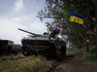 Ukrainian army paratrooper leaves the ACV (airborne combat vehicle) after patroling the territory of Anti-terrorist Opp Base in Donetsk regi...