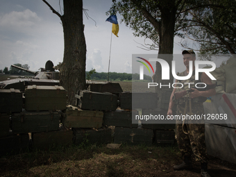 Ukrainian army paratrooper patrols the territory of Anti-terrorist Opp Base in Donetsk region (