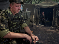Ukrainian army paratroopers rest after patroling the territory of Anti-terrorist Opp Base in Donetsk region (