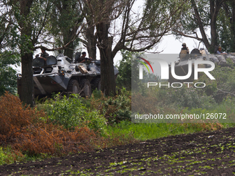 Military APC's patrol (Photo by Sergii Kharchenko/NurPhoto)