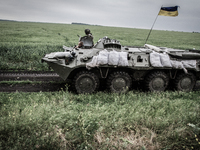 Ukrainian military APC patrols Donetsk region, on May 31, 2014. Over 20 Ukrainian army personnel have been killed during the special operati...