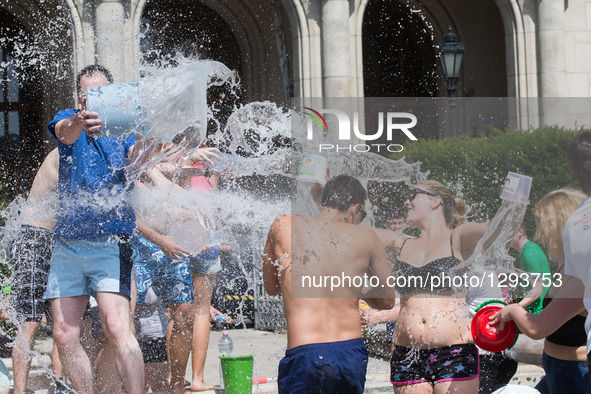 Young people participate in a water fight flashmob in Budapest, Hungary, June 25, 2016. The event was organized by young people on Facebook...