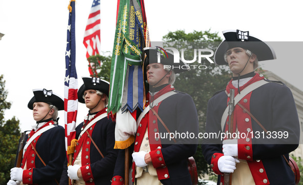 People take part in the Independence Day parade in Washington D.C., capital of the United States, July 4, 2016. The United States celebrated...