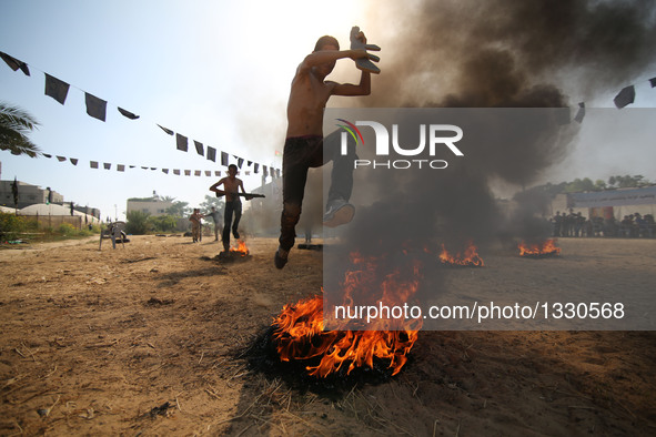 Palestinians take part in a military exercise at a summer camp, organized by Islamic Jihad movement, in the southern Gaza Strip City of Khan...