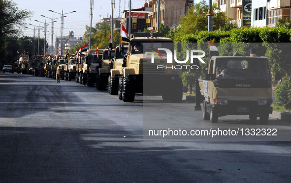 Iraqi military vehicles are seen in a military parade in Baghdad, Iraq, July 14, 2016. Prime Minister Haider al-Abadi on Thursday presided o...