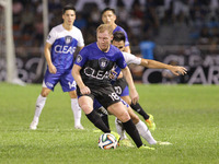 Makati, Philippines - Former Manchester United player Paul Scholes controls the ball during an exhibition game against local amatuer and pro...