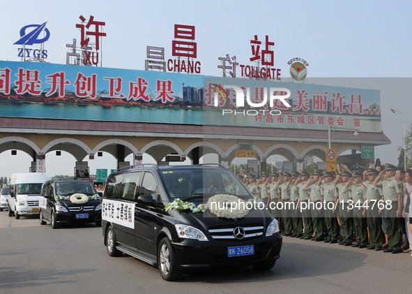 Two black hearses carrying the coffins of Chinese UN peacekeepers killed in the recent fighting in the conflict-hit South Sudan are seen in...