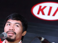 Makati, Philippines - Filipino boxing champion Manny Pacquiao answers questions from the media after being appointed as head coach of KIA, a...