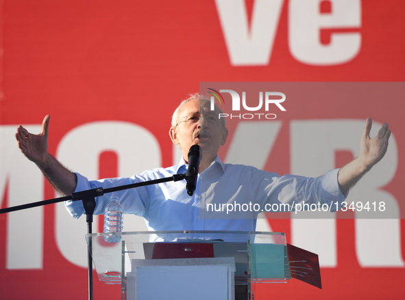 Turkey's Republican People's Party (CHP) leader Kemal Kilicdaroglu delivers a speech to the crowd during a rally at Istanbul's Taksim square...