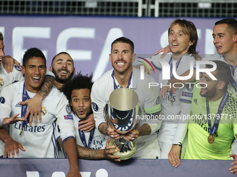 Sergio Ramos lifts the trophy after the UEFA Super Cup match between Real Madrid and Sevilla at Lerkendal Stadion on August 9, 2016 in Trond...