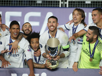 Sergio Ramos lifts the trophy after the UEFA Super Cup match between Real Madrid and Sevilla at Lerkendal Stadion on August 9, 2016 in Trond...