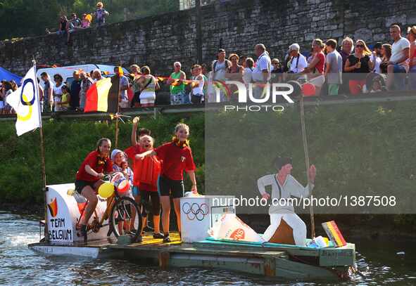 Participants take part in the International Bathtub Regatta on the Meuse River in Dinant, southern Belgium on Aug. 15, 2016. Starting in 198...