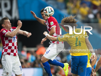 SAO PAULO BRAZIL--12 June: Olic, David Luiz and Lovren in the match between Brazil and Croatia in the group stage of the 2014 World Cup, for...