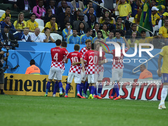 Croatia celebrate the score (1-0) in the match between Brazil and Croatia in the group stage of the 2014 World Cup, for the group A match at...