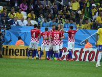 Croatia celebrate the score (1-0) in the match between Brazil and Croatia in the group stage of the 2014 World Cup, for the group A match at...