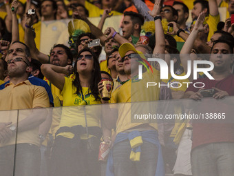 Crowd cheers for Brasil x Croatia in the first match of the World Cup, in Sao Paulo, Brasil (