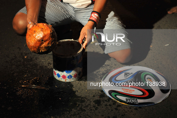 SOLO, CENTRAL JAVA, INDONESIA - JUNE 12 : Indonesian man prepare playing football fire 
