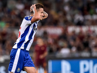 Porto's Brazilian midfielder Otavio reacts after missing a goal during the UEFA Champions League playoff match between AS Roma and FC Porto,...