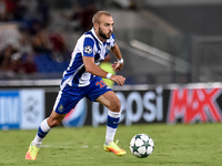 Porto's Portuguese midfielder Andre Andre in action during the UEFA Champions League playoff match between AS Roma and FC Porto, at Olympic...