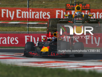 Daniel Ricciardo of Australia and RedBull racing driver in a special multiexposure picture during the qualification at Hungarian Formula One...