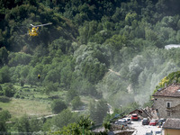 An elicopter over the Pescara del Tronto, on August 24, 2016. A powerful pre-dawn earthquake devastated mountain villages in central Italy o...