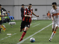 Dejan Damjanovic of FC Seoul and Zhang Chi of Shandong Luneng FC action during an ACL 2016 FC Seoul V Shandong Luneng FC match at World Cup...
