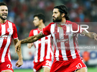 Olympiaco's Argentinian midfielder Chori Domiguez (R) celebrates after scoring a goal during UEFA Europa League match between FC Olympiacos...