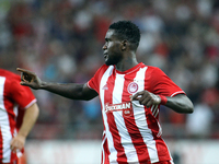 Olympiaco's Greek forward Brown Ideye celebrates after scoring a goal during UEFA Europa League match between FC Olympiacos and FC Arouca at...