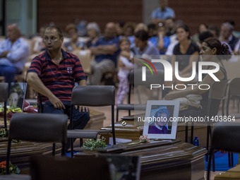 Relatives of earthquake victims during the night vigil for the vicitms of earthquake in Ascoli Piceno during the funeral wake on August 26,...