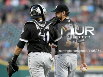 Chicago White Sox starting pitcher James Shields (25) talks to catcher Alex Avila (31) during the first inning of a baseball game against th...