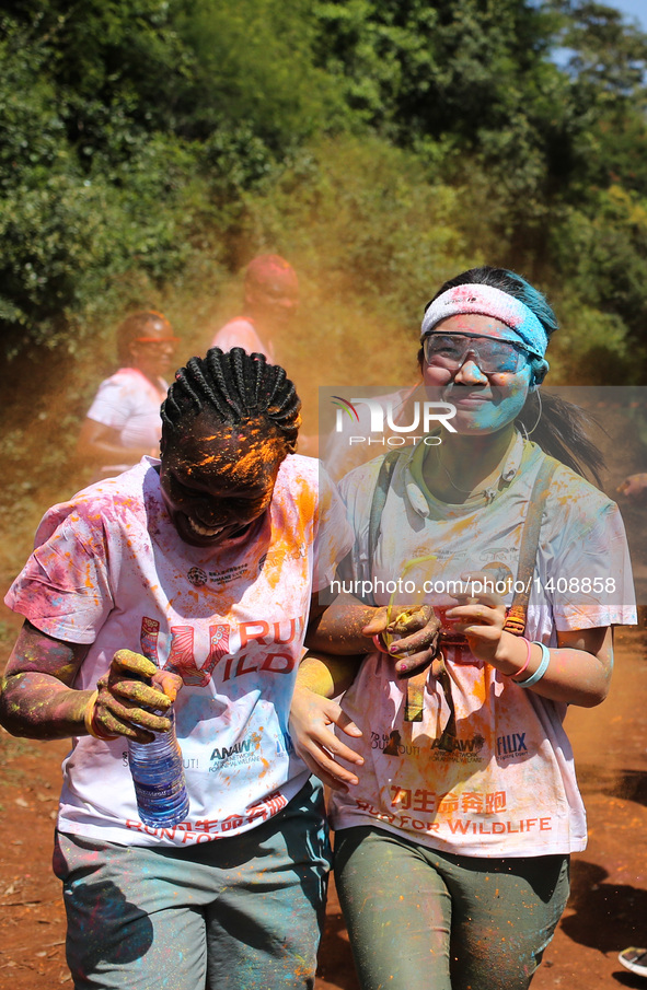 Runners participate in the Color Run in Nairobi, capital of Kenya, Aug. 28, 2016. The Color Run, known as 