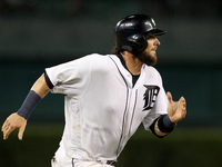 Detroit Tigers catcher Jarrod Saltalamacchia (39) scores a run on a single hit by second baseman Ian Kinsler (3) in the sixth inning of a ba...