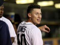 Detroit Tigers third baseman JaCoby Jones (40) celebrates in the dugout after scoring a run in the sixth inning of a baseball game against t...