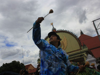 Javanese peoples jostle for food and offerings known as 'Gunungan' during the Grebeg Besar ritual in Yogyakarta, Indonesia, on September 13,...