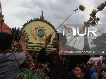 Javanese peoples jostle for food and offerings known as 'Gunungan' during the Grebeg Besar ritual in Yogyakarta, Indonesia, on September 13,...