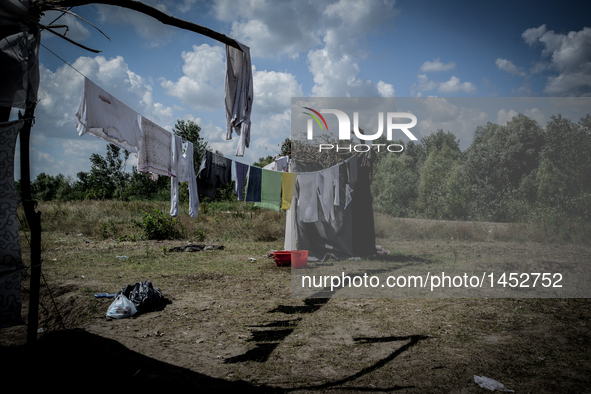 A general view of makeshift refugee camp on the Serbian side of the border with Hungary near the town of Horgos on August 12, 2016. 
