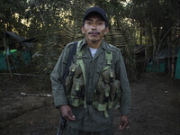 Guerrillas from FARC EP meet during the firsts hours in the morning for notice the daily labours in Llanos del Yari, a town in an Indigenous...