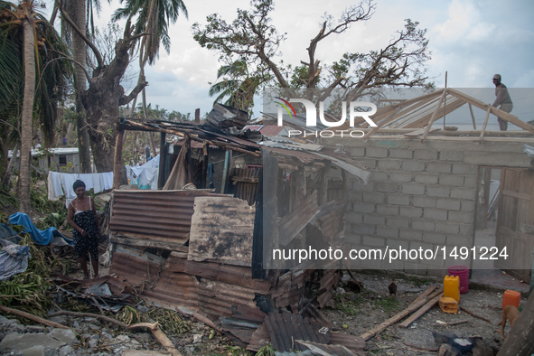 Residents have started to repair their damaged houses in village on Tapyon near Les Cayes, Haiti, on October 9, 2016.The number of people ki...