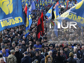  Activists and supporters of Ukrainian nationalist parties attend a rally to celebrate the 74th anniversary of Ukrainian Insurgent Army (UPA...
