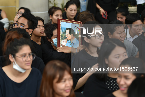 Thai people mourn for Thai King Bhumibol Adulyadej near the Grand Palace in Bangkok, Thailand, on Oct. 14, 2016. The remains of Thai King Bh...