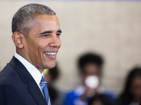 US President Barack Obama delivers remarks on education at Benjamin Banneker Academic High School in Washington,DC on October 17, 2016. (