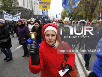 Members of Trade Union of Education and Science of Ukraine protest against the increase tariffs for housing and communal utility services,in...