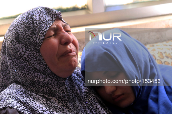 Ramallah, West Bank, Palestine, June 25, 2014: female relatives of Palestinian Mostafa Aslan , 24, who was died of injuries he shot at 20 Ju...